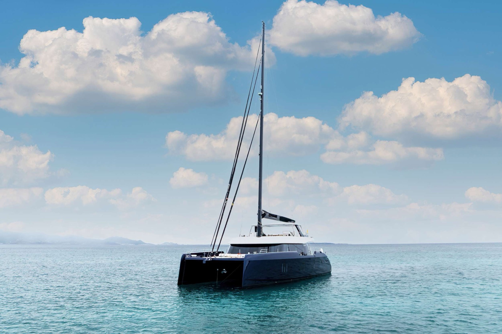 Belldia, luxury catamaran, cruising at sea
