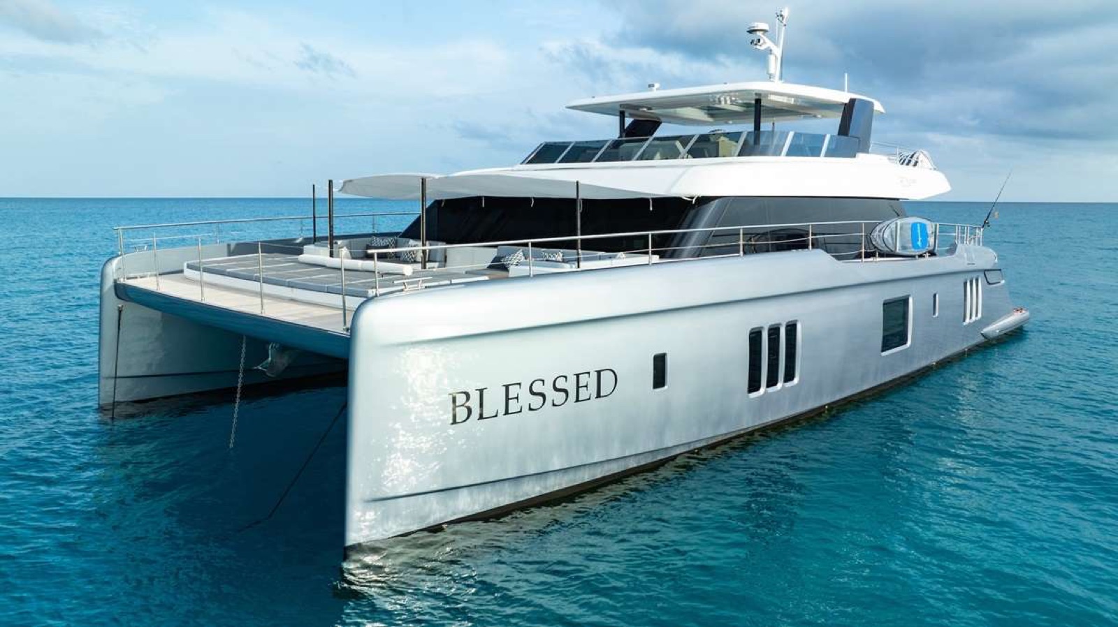 BLESSED, power catamaran, cruising at sea