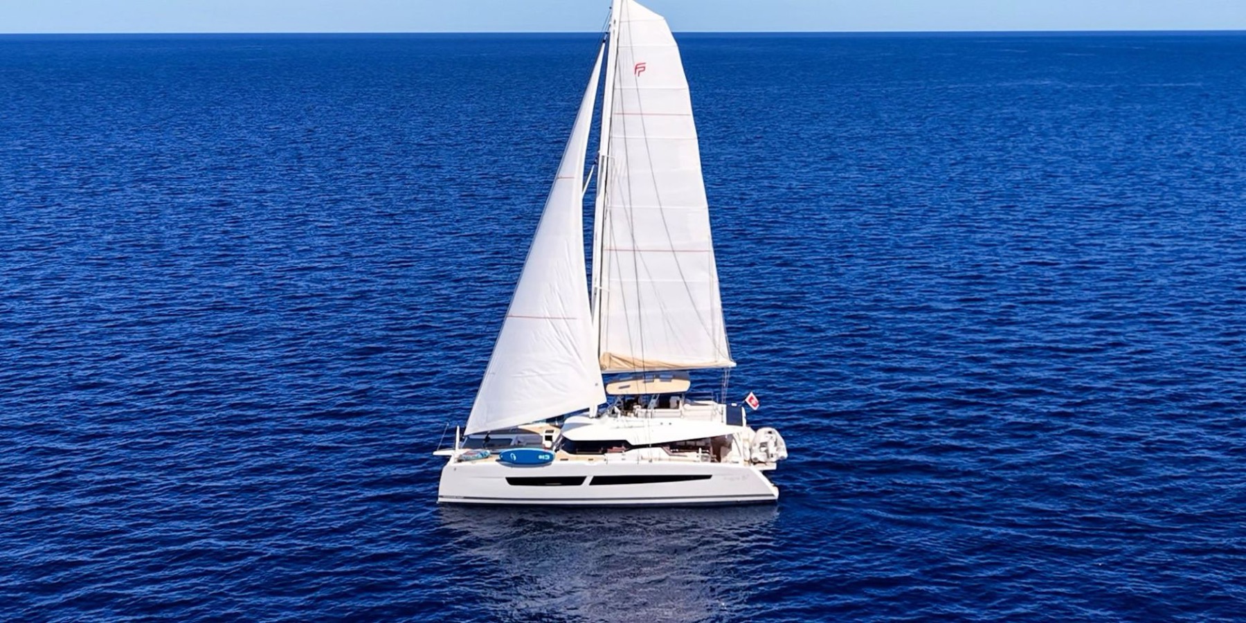 BLUESATION, a Fountaine Pajot sailing catamaran, underway