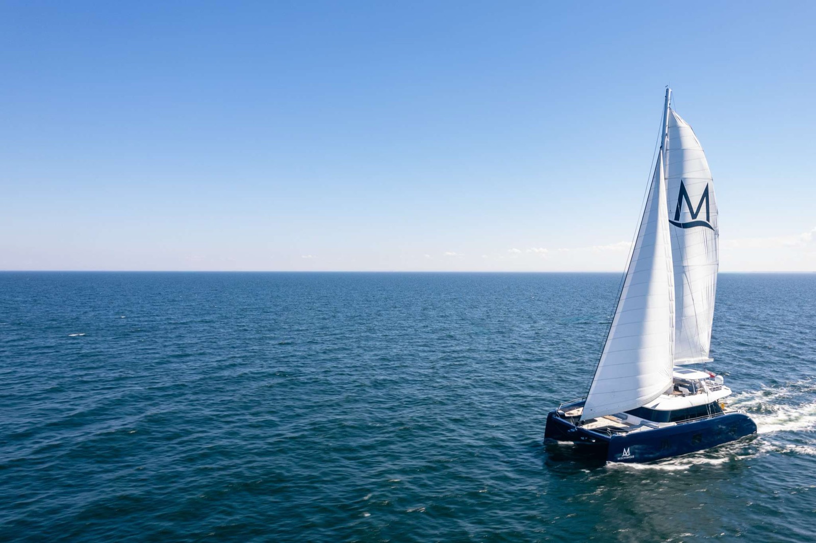 MISCHIEVOUS, luxury catamaran, cruising at sea