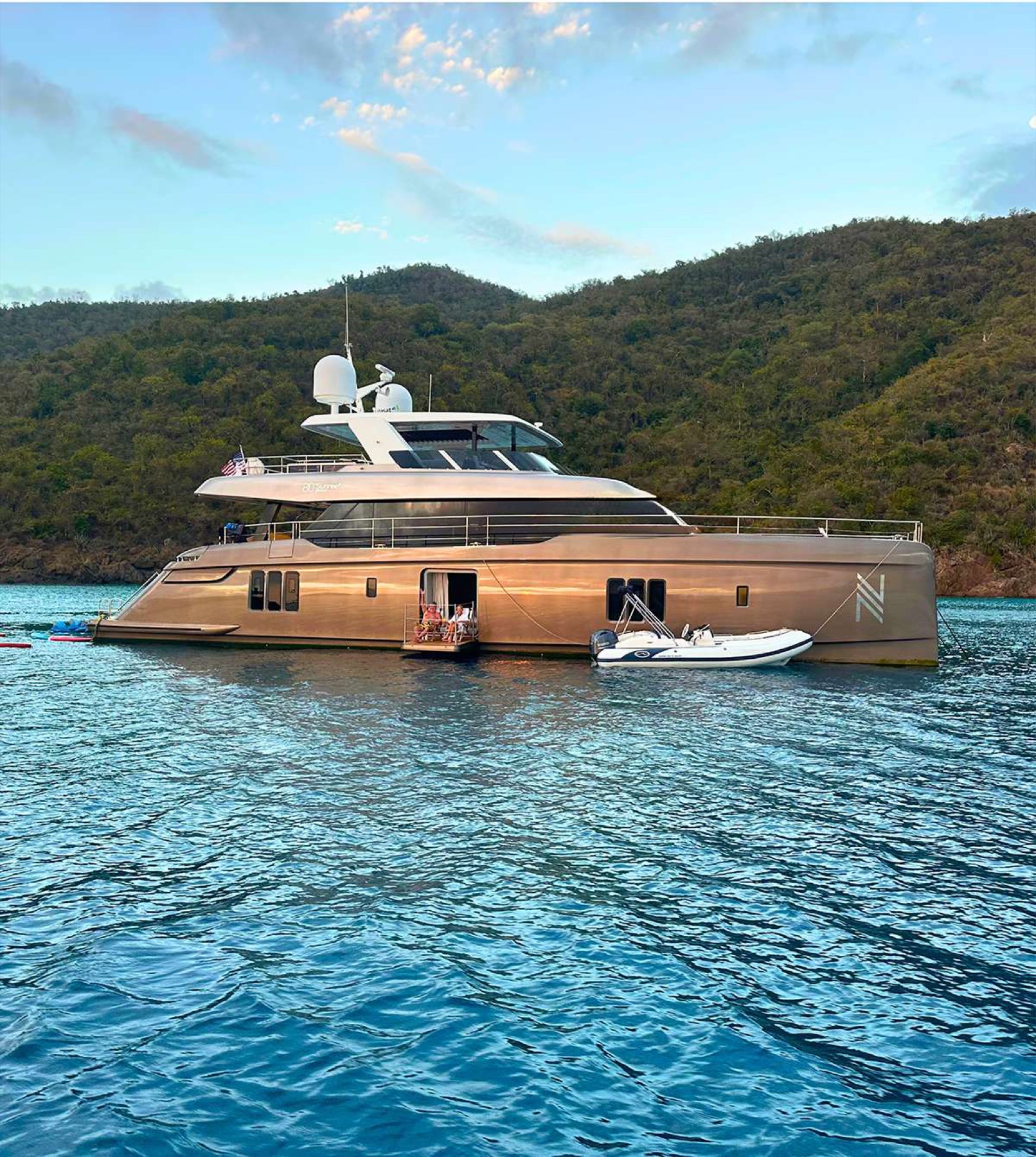 NAUTI NICKEL, a Sunreef power catamaran, at anchor